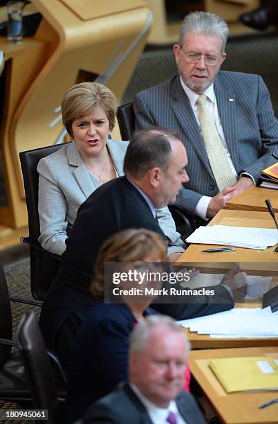 Deputy First Minister Nicola Sturgeon reacts to a comment during a debate at the Scottish Parliament on the future of Scotland on Wednesday September...