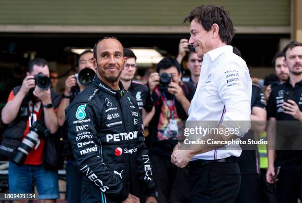 Lewis Hamilton of Great Britain and Mercedes-AMG PETRONAS F1 Team and Toto Wolff of Mercedes-AMG PETRONAS F1 Team looks on during previews ahead of...