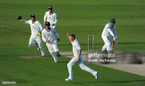 Durham players Will Smith Phil Mustard and Paul Collingwood celebrate as Notts batsman Paul Franks is bowled by Scott Borthwick during day two of the...