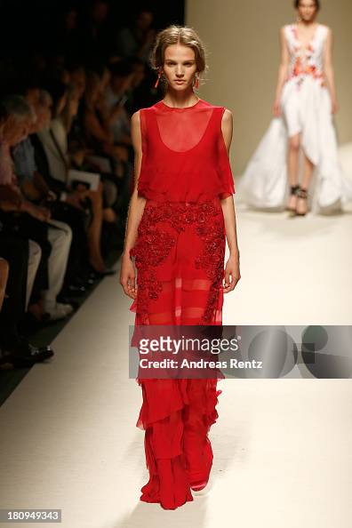 A model walks the runway during the Alberta Ferretti show as a part ...