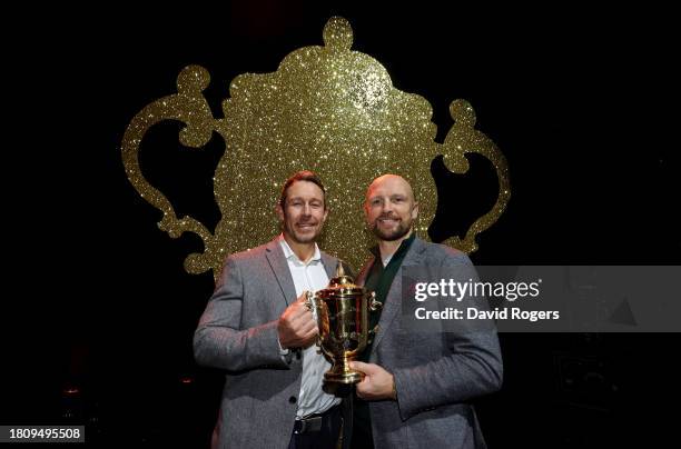 Jonny Wilkinson and Matt Dawson pose with the Webb Ellis trophy during the 2003 England Rugby World Cup winning squad reunion at the Eventim Apollo...