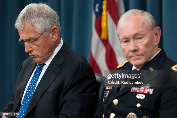 Secretary of Defense Chuck Hagel Chairman of the Joint Chiefs of Staff Gen. Martin E. Dempsey brief the press at the Pentagon, September 18, 2013 in...