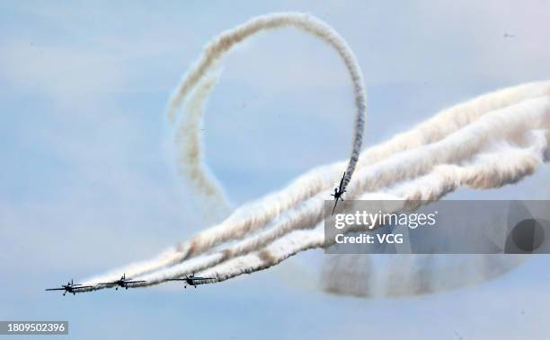 The European 'Fly-by Knights' aerobatic team performs at the opening ceremony of Aero Asia 2023 on November 23, 2023 in Zhuhai, Guangdong Province of...