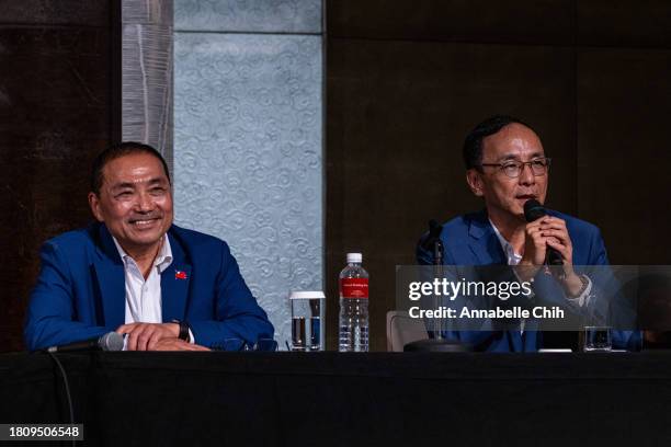 The presidential candidate of Kuomintang , Hou Yu-ih , and and the chairman of Kuomintang , Eric Chu , attend a press conference of potential...