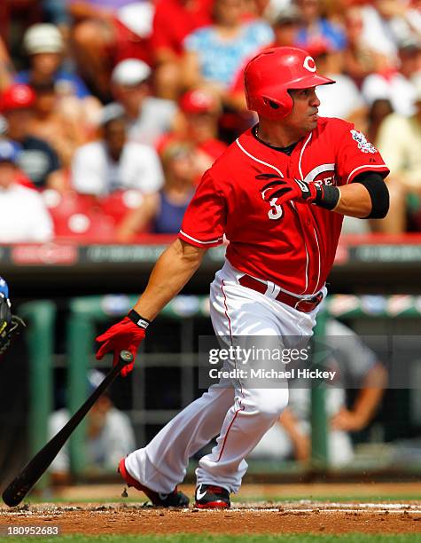 Cesar Izturis of the Cincinnati Reds watches the ball during the first inning against the Los Angeles Dodgers at Great American Ball Park on...