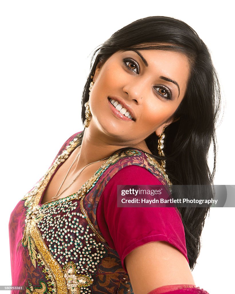 Female Asian Model with head tilted on white