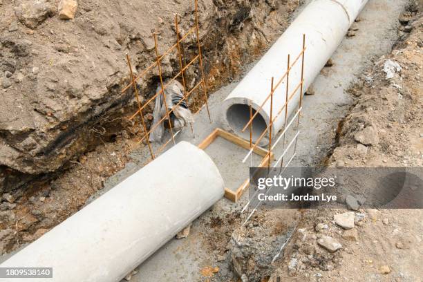 drainage pipe on a construction site - ondergrond stockfoto's en -beelden