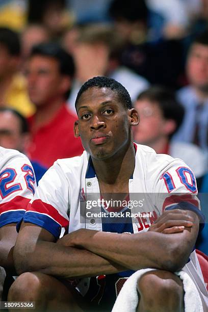 Dennis Rodman of the Detroit Pistons looks on against the Boston Celtics during a game played in 1988 at the Boston Garden in Boston, Massachusetts....