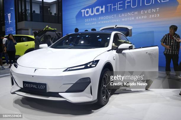 Photo taken on Nov. 29 shows an electric vehicle by China's Changan Automobile Co. On display at the Thailand International Motor Expo in Bangkok.