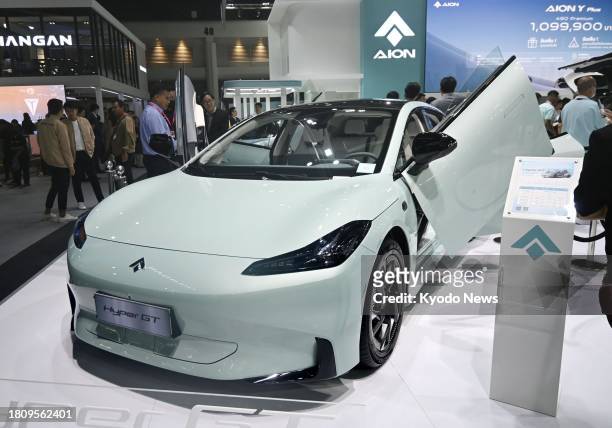 Photo taken on Nov. 29 shows an electric vehicle by China's Guangzhou Automobile Group Co. On display at the Thailand International Motor Expo in...