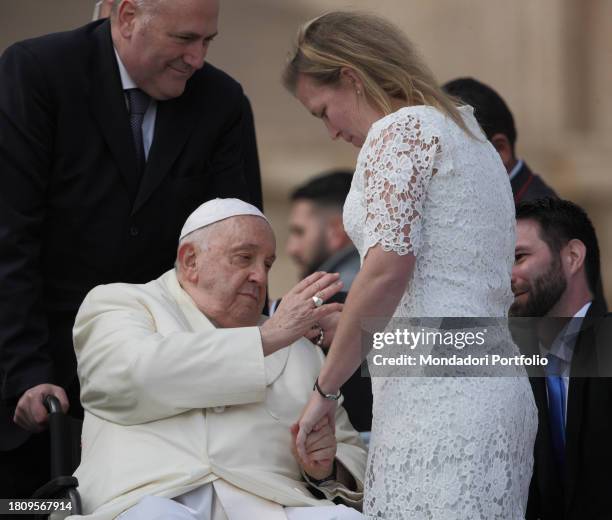 Pope Francis greets a pregnant woman during the General Audience in St. Peter's Square. Vatican City , November 22nd, 2023.