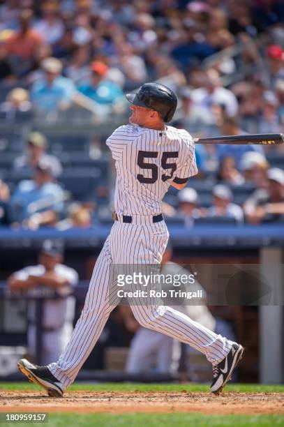 Lyle Overbay of the New York Yankees bats during the game against the Detroit Tigers at Yankee Stadium on August 10, 2013 in the Bronx borough of...