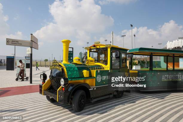 The Expo Explorer compressed-air train waits for passengers outside the Green Zone entrance ahead of the COP28 climate conference at Expo City in...