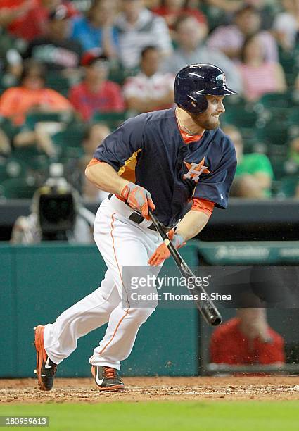 Trevor Crowe of the Houston Astros bats against the Los Angeles Angels of Anaheim on September 15, 2013 at Minute Maid Park in Houston, Texas.