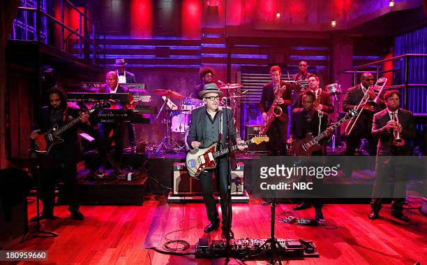 Episode 893 -- Pictured: Music guest Elvis Costello performs with The Roots on September 17, 2013 --