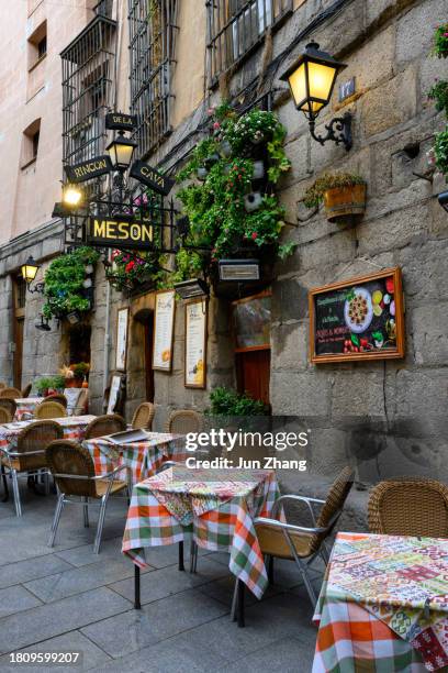 street side restaurant tables in madrid - madrid stock pictures, royalty-free photos & images