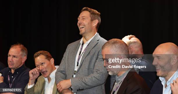 Jonny Wilkinson faces the audience surrounded by former team mates during the 2003 England World Cup winning squad reunion at the Eventim Apollo on...