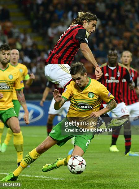 Milan's forward Alessandro Matri fights for the ball with Celtic Glasgow's defender Adam Matthews during the Champions League football match between...