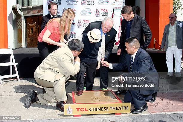 Actor Jerry Maren, Councilman Tom Labonge and driver Gray Gauldin attend the handprint-footprint ceremony for "The Lollipop Kid" last of the...