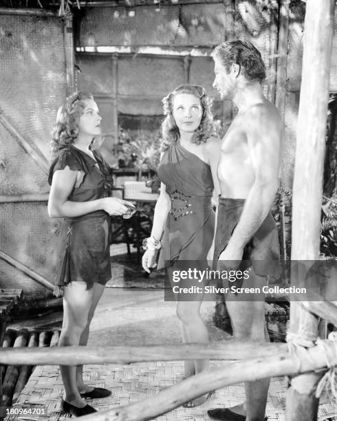 Brenda Joyce as Jane, Evelyn Ankers as Gloria James Jessup, and Lex Barker as Tarzan, in 'Tarzan's Magic Fountain', directed by Lee Sholem, 1949.