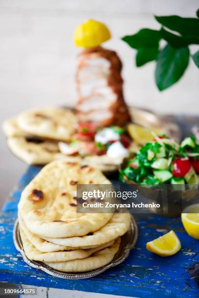 arabian flatbread, with vegetables salad. - naan bread stock pictures, royalty-free photos & images