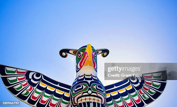 first nation's carving of thunderbird - totem pole stock pictures, royalty-free photos & images