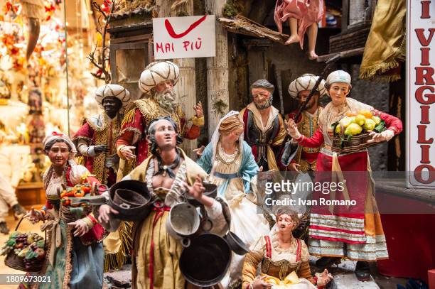 The shepherds of the nativity scene of San Gregorio Armeno, painted with the red mustache in support against violence toward women on November 23,...