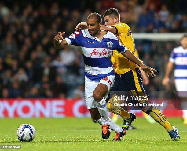 Karl Henry of QPR looks to shake off Jake Foster-Caskey of Brighton during the Sky Bet Championship match between Queens Park Rangers and Brighton &...