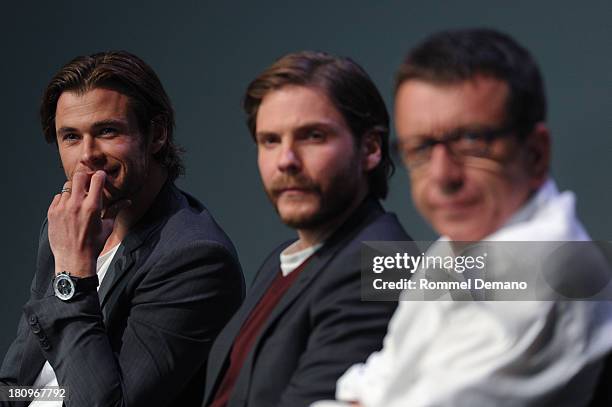 Actors Chris Hemsworth, Daniel Bruhl and screenwriter Peter Morgan attend Meet The Actors at the Apple Store Soho on September 18, 2013 in New York...