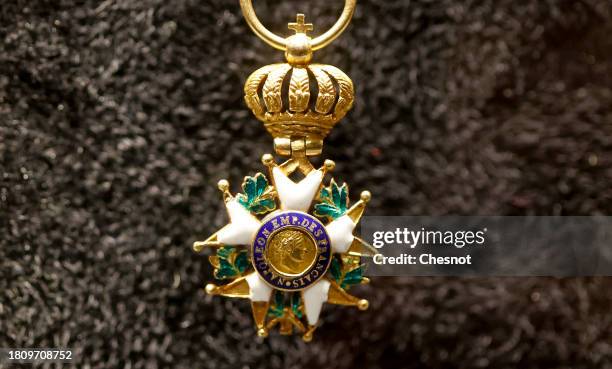 The cross of the legion of honor of Emperor Napoleon I displayed at Hotel Drouot on November 23, 2023 in Paris, France. Napoleon's Legion of Honor...