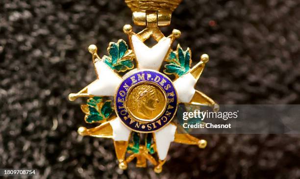 The cross of the legion of honor of Emperor Napoleon I displayed at Hotel Drouot on November 23, 2023 in Paris, France. Napoleon's Legion of Honor...