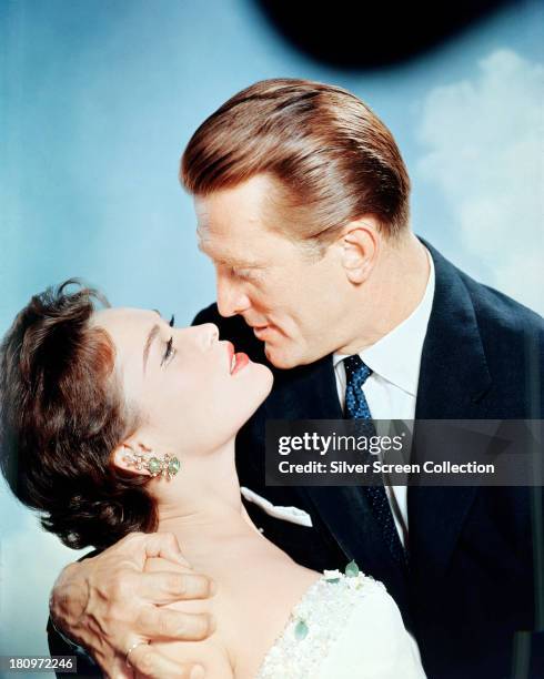 American actor Kirk Douglas and French-American actress Bella Darvi in a promotional portrait for 'The Racers', directed by Henry Hathaway, 1955.