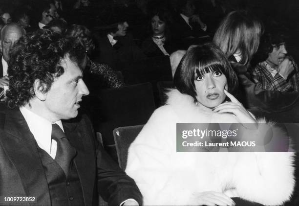 Jacques Martin et Danièle Evenou assistant au concert d'Enrico Macias à l'Olympia de Paris, le 13 mars 1974.