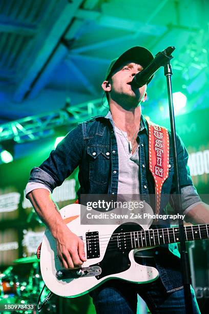 Justin Moore peforms at the MLB Fan Cave on September 18, 2013 in New York City.