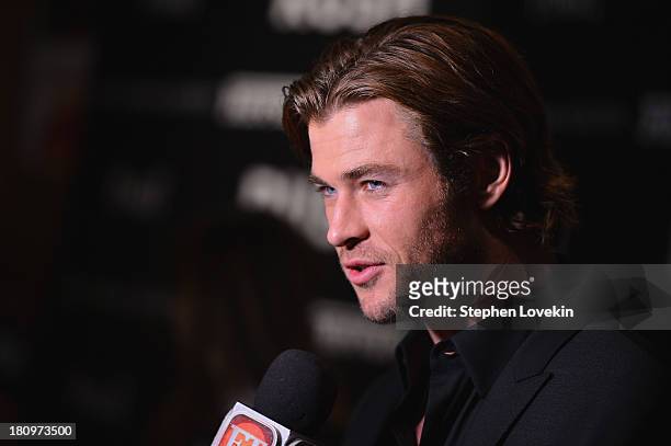 Actor Chris Hemsworth attends the Ferrari and The Cinema Society Screening of "Rush" at Chelsea Clearview Cinemas on September 18, 2013 in New York...