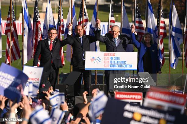 Speaker of the House Mike Johnson , House Minority Leader Hakeem Jeffries and Senate Majority Leader Chuck Schumer, , appear onstage during 'March...