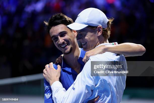 Jannik Sinner and Lorenzo Sonego of Italy celebrate winning match point during the Quarter-Final doubles match against Tallon Griekspoor and Wesley...