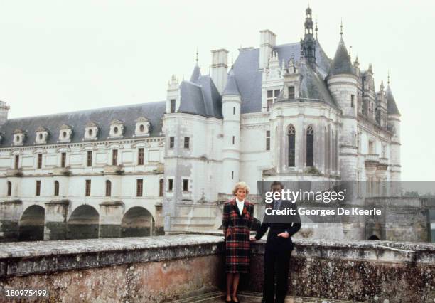 Charles and Diana, Prince and Princess of Wales, pose outside Chateau de Chambord during their official visit to France on November 9, 1988 in...
