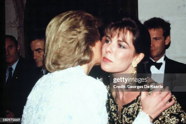 Diana, Princess of Wales, greets Princess Caroline of Monaco on a dinner at the Chateau de Chambord during her official visit to France on November...