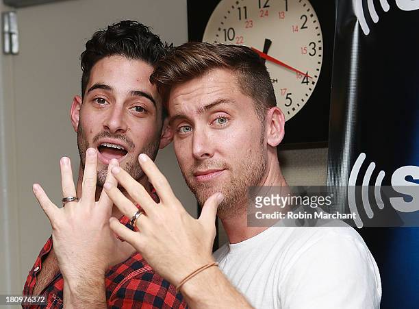 Newly engaged couple Michael Turchin and Lance Bass show their new David Yurman rings in the SiriusXM studio during Bass' show "Dirty Pop with Lance...