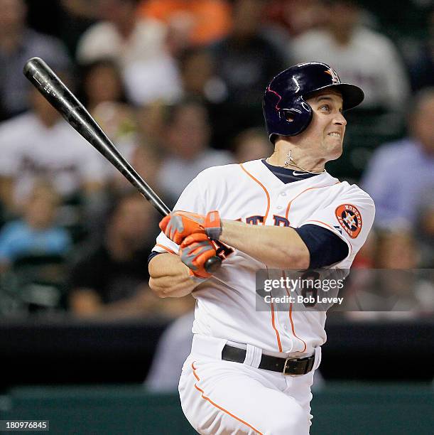 Trevor Crowe of the Houston Astros flies out to center in the third inning against the Cincinnati Reds at Minute Maid Park on September 18, 2013 in...