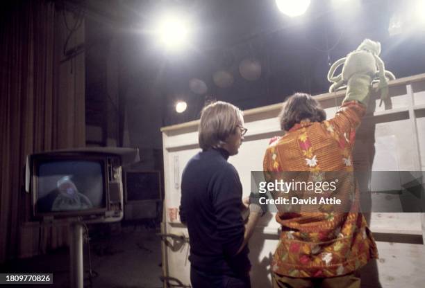Puppeteers Frank Oz and Jim Henson during the taping of Sesame Street's very first season, taken for America Illustrated Magazine, at Reeves TeleTape...