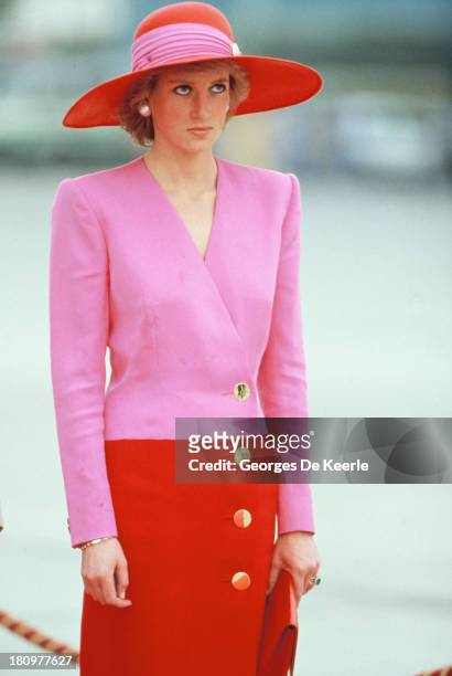 Diana, Princess of Wales, wears a Catherine Walker suit and a Philip Somerville hat during her official tour of the Gulf States on March 15, 1989 in...