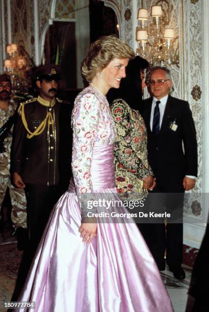 Diana, Princess of Wales, attends a dinner at the Crown Prince's Palace during her official tour of the Gulf States on March 13, 1989 in Kuwait City,...