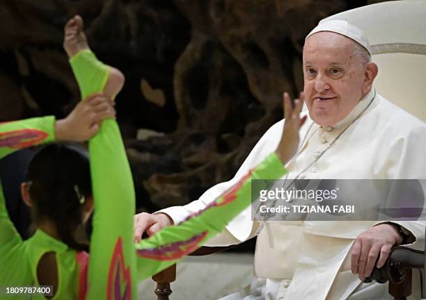 Participants of the Italian Circus Talent Festival 2023 perform in front of Pope Francis during the weekly general audience at Paul-VI hall in The...