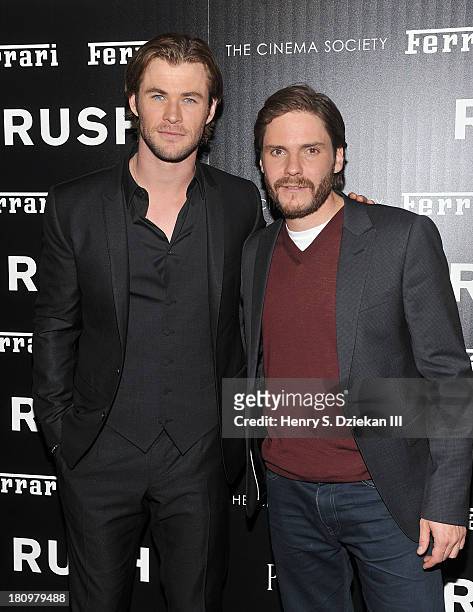 Actors Chris Hemsworth and Daniel Bruhl attend the Ferrari & The Cinema Society screening of "Rush" at Chelsea Clearview Cinema on September 18, 2013...