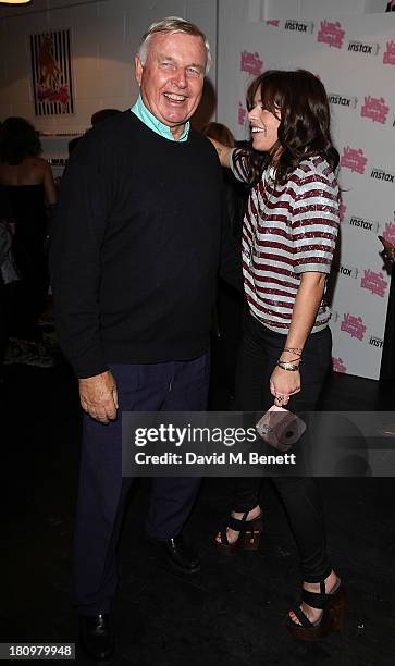 Simon Keswick and Willa Keswick attend the launch party for Village Bicycle Brick Lane on September 18, 2013 in London, England.