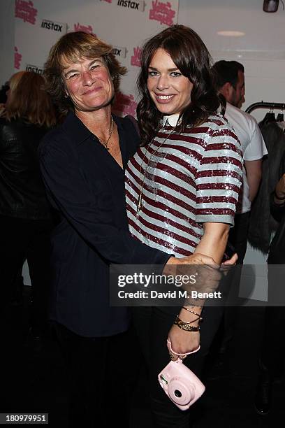 Owner Willa Keswick with her mother attend the launch party for Village Bicycle Brick Lane on September 18, 2013 in London, England.