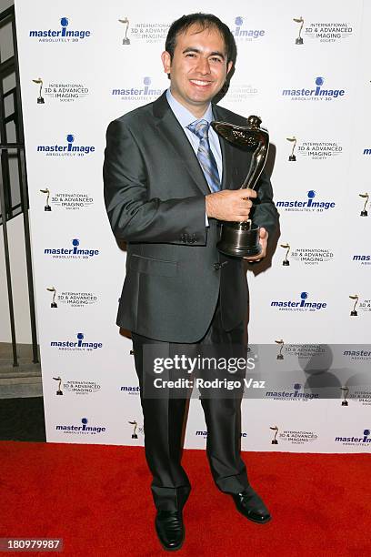 Dr. Ahmet F. Coskun receives an award at the International 3D Society & Advanced Imaging Society 3D Products of the Year Awards at Paramount Studios...