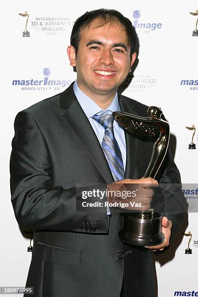 Dr. Ahmet F. Coskun receives an award at the International 3D Society & Advanced Imaging Society 3D Products of the Year Awards at Paramount Studios...